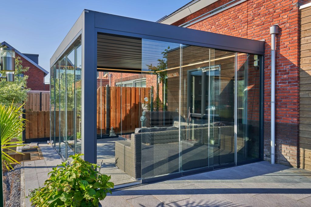 Glass veranda attached to a modern UK home