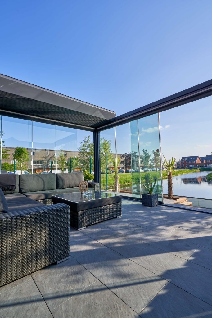 Modern canopy covering garden dining area